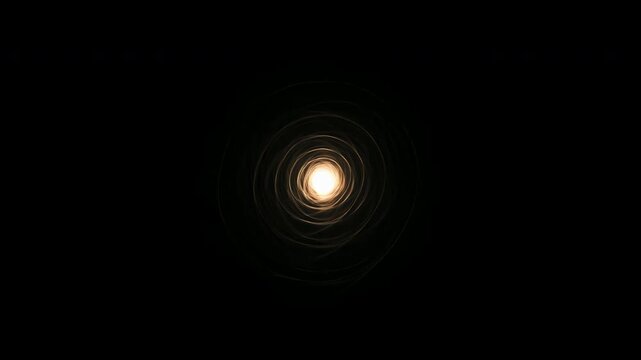 Glowing amber rings contract around a bright central light as the circular formation steadily recedes against a black background, revealing layered curves and increasing dark negative area