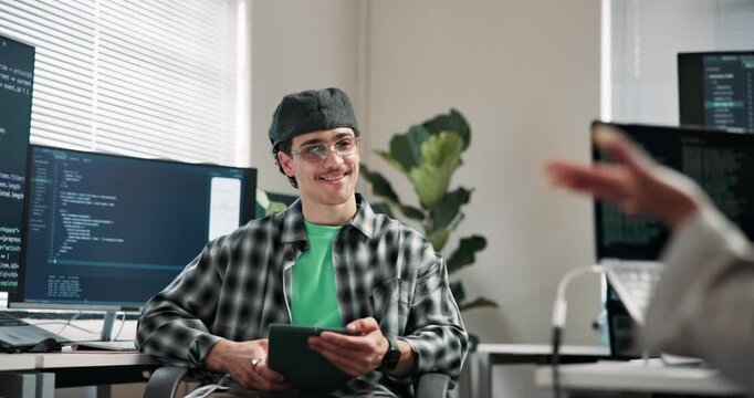 Programmer, man and tablet in office for advice, technical guidance and feedback loop for bug trace. Team, happy developer and tech screen for pull request, code review and coworking on system design