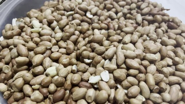 Organic healthy peanuts heap texture high angle view