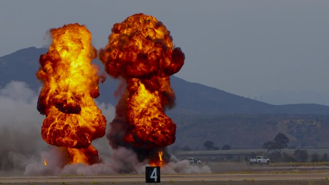 Large fireball explosions in a military demonstration