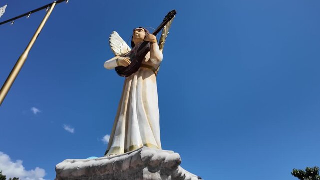 Angel statue playing musical instrument at Simala Shrine, Cebu