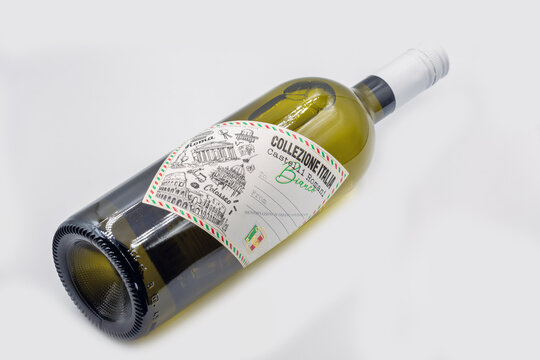 Collezione Italia Castelli Romani Bianco wine bottle closeup on white.