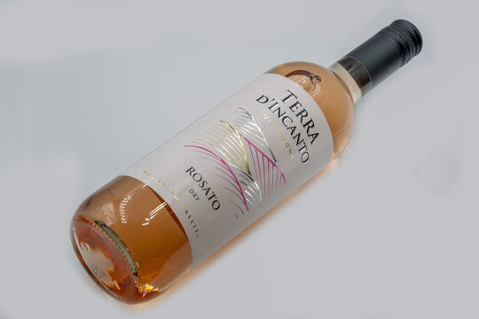Terra d Incanto Rosato Italian wine bottle closeup on white.