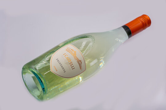 I Castelli Frizzante Italian sparkling wine bottle closeup on white.