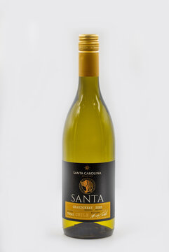 Santa Carolina Chardonnay 2023 Chilean wine bottle closeup on white.