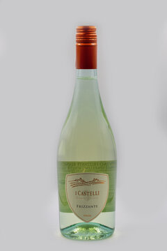 I Castelli Frizzante Italian sparkling wine bottle closeup on white.