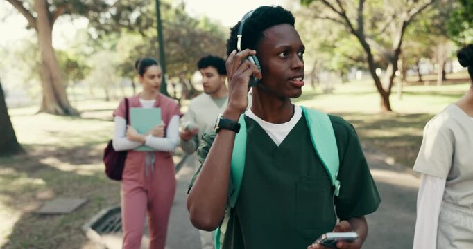 Music, phone and medical student or man in park for future, healthcare and opportunity. Doctor program, nursing internship and headphones with person outdoor for residency training and podcast