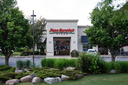 Wausau, Wisconsin, USA - July 11, 2026: Papa Murphy's take-and-bake pizza storefront with landscaping in the foreground.