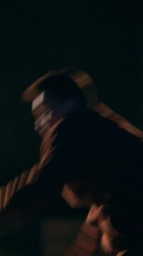 The guy does one somersault forward and two with a turn back, night city