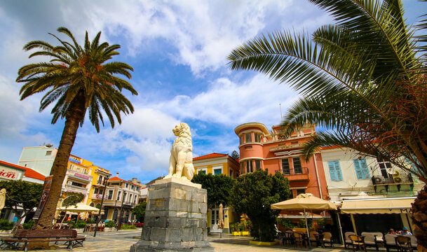 Samos, Greece - June 18, 2023; Vathy Village street view in Samos Island. Vathy Village square lion sculpture