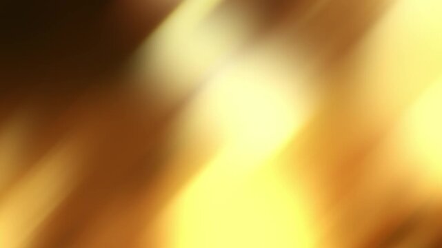 Diagonal streams of golden light move continuously across a warm defocused background in a seamless loop.