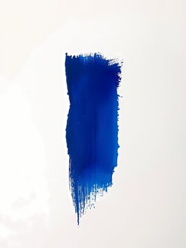 白背景に描かれた青い一筆のストローク