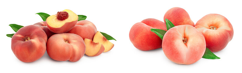 Ripe chinese flat peach fruit and half with leaf isolated on white background © kolesnikovserg