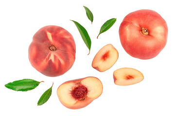 Ripe chinese flat peach fruit and half with leaf isolated on white background. Top view. Flat lay © kolesnikovserg