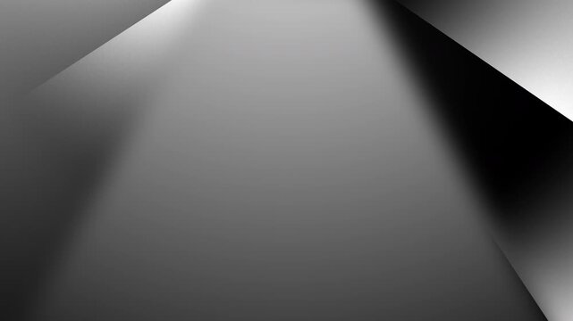 Abstract monochrome background featuring dramatic geometric planes, soft gray gradients, sharp black shadows