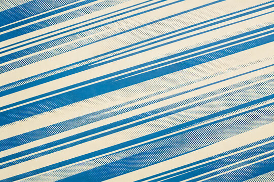 A diagonal striped pattern combining solid blue and halftone blue lines on a beige background, forming a clean graphic design.