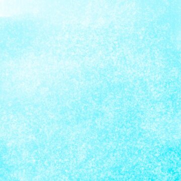 Abstract light blue background with white grainy speckles and soft gradient texture