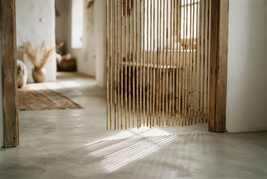Bamboo beaded curtain in light-filled hallway