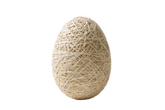 Realistic handmade Easter egg intricately wrapped with natural twine for festive decoration