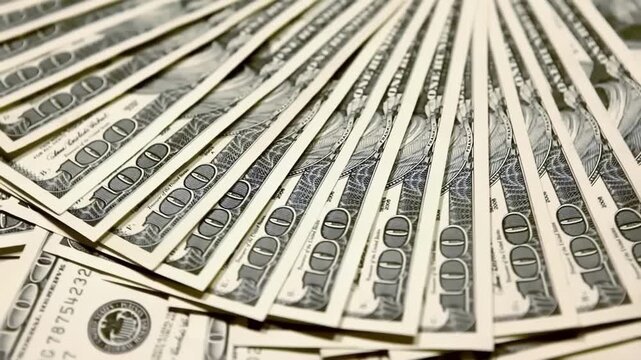 Close-Up of One Hundred Dollar Banknotes Arranged in a Fan Pattern