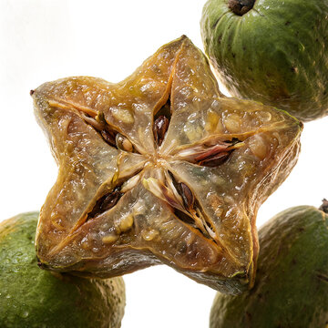 Fresh Averrhoa carambola cross section and cherimoya fruit cut out
