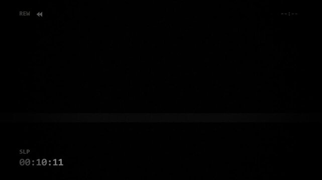 Dark Video Playback Interface with Rewind Indicator and Time Counter