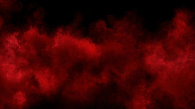 Abstract red smoke explosion or powder cloud burst on isolated black background