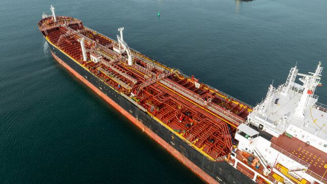 Aerial view of big oil, chemical tanker sails. Tanker ship logistic and transportation business oil and gas industry.