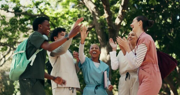 Medical, students and high five for support at university, nursing school and studying for development. Friends, campus and people in circle for success, achievement and bonding for education outdoor
