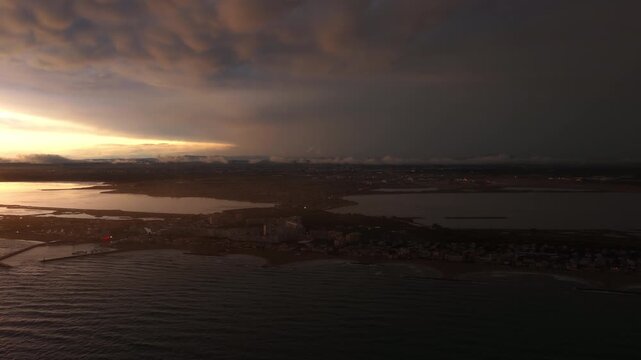 Storm front over Carnon beach town lagoon and Mediterranean coast