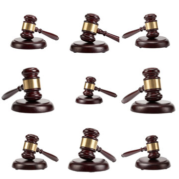 Collection of wooden judge gavels with gold accents against black backdrop