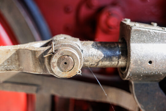Moving rod mechanism detail on vintage steam locomotive