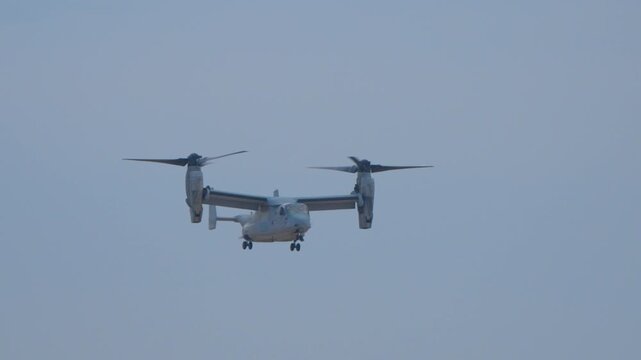 Osprey military craft coming for a vertical landing