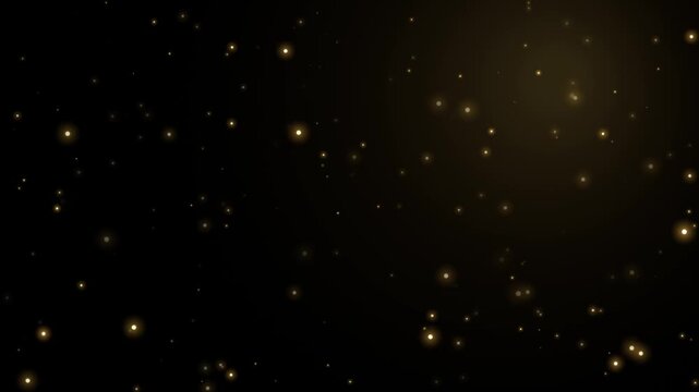Golden glowing particles sparkle and float against a dark, ethereal background, creating a magical and celebratory atmosphere.