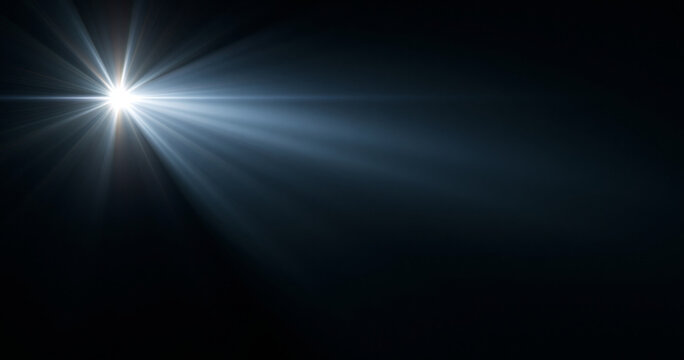 Bright white light beam in darkness