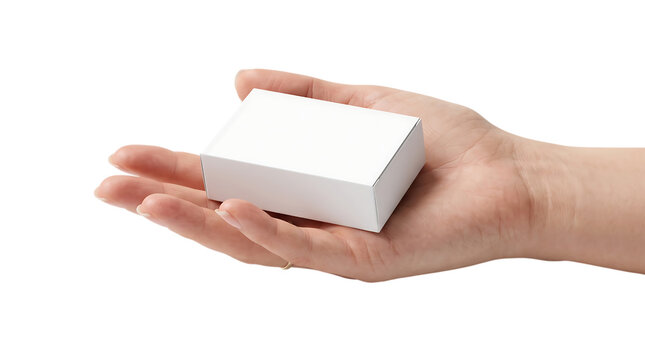 A human hand gently holding a small white pixelated cube isolated on a white background