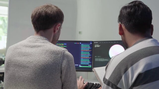Team engineers software development are brainstorming using computer writing code. Programmer teamwork meetings using technology artificial intelligence work system about cyber security and coding