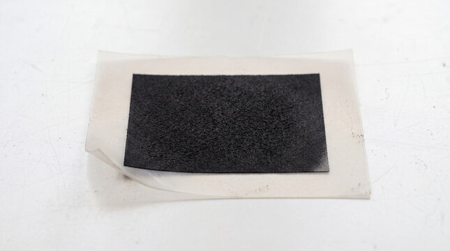 Catalyst-coated membrane for a PEM hydrogen electrolyser lying on a cleanroom workbench