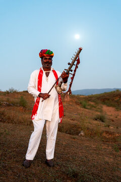 Rajasthani folklore musician playing  Ravanahatha instrument in Pushkar Rajasthan India