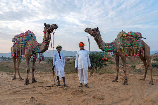 Two camel herder during Pushkar Mela Camel Fair Festival
