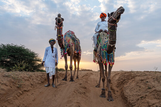 Two camel herder during Pushkar Mela Camel Fair Festival