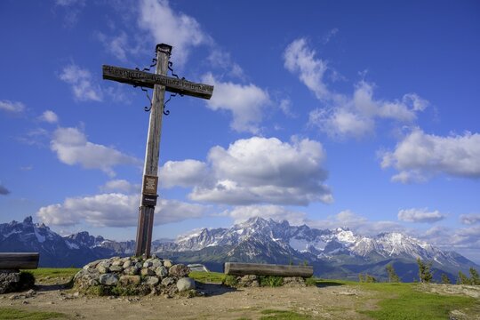 Ro&szlig;brand summit cross with Dachstein massif, Radstadt, Salzburg, Austria