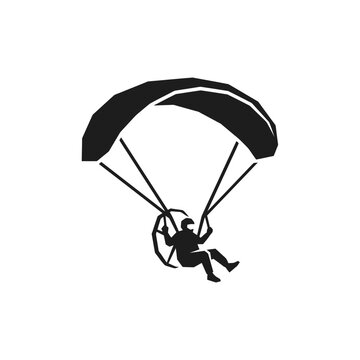 Paraglider silhouette flying with parachute