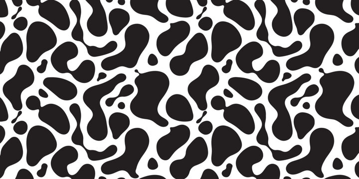 Black and white abstract animal print pattern with organic ink spots