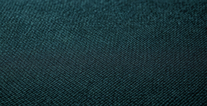 close-up view of dark textured fabric, showcasing intricate weave patterns and details, ideal for backgrounds, banners, and posters.