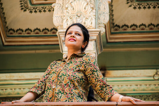 Portrait of young Indian woman, looking up in kalamkari kurti