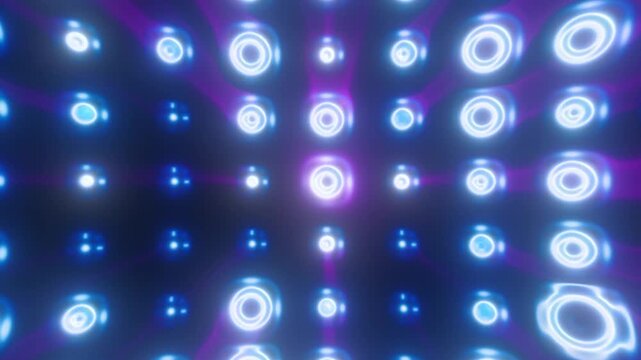 Glowing blue and violet rings pulse across abstract digital tunnel, forming repeating field of luminous circles. Futuristic light pattern shifts in depth and scale with calm, hypnotic rhythm.