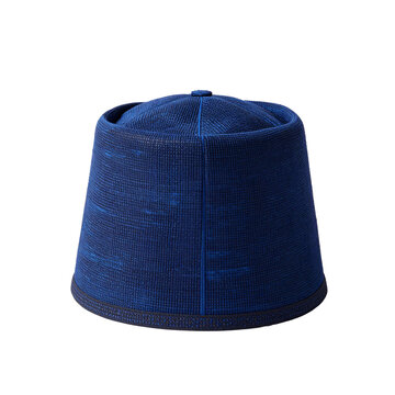 Blue patterned fabric kufi hat on a white background