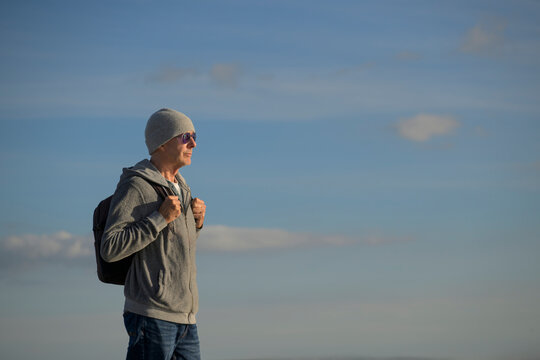 Senior Man Hiking in Autumnal Evening Light