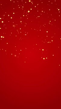 abstract red luxury gold dust falling motion background with golden glitter shiny stars and bokeh lights and particles, holiday christmas new year vertical social media design element
